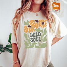 ** FOR OVERSIZED LOOK, SIZE UP ** Comes in multiple colors! Check out more designs here: www.etsy.com/shop/jadeandroseshop ✨️SIZE AND FIT: Your shirt will be printed on a high-quality, soft and comfortable unisex t-shirt. Sizes run true to size, which takes the guesswork out of ordering. If you like your t-shirts loose or oversized - size up. For a more fitted women's style - size down. If you are looking for the 'shirt dress' look you see in some of the photos, size up 2 or 3 sizes. Please refe Green Graphic Tee With Plant Print, Green Graphic Tee With Plants Print, Multicolor Crew Neck T-shirt With Plant Print, Yellow Plants Print Short Sleeve T-shirt, Yellow Short Sleeve T-shirt With Plant Print, Graphic Tee With Plant Print Crew Neck, Yellow T-shirt With Plants Print, Yellow Crew Neck T-shirt With Plant Print, Abstract Shirt