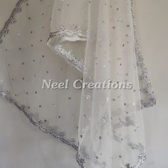 Silver Indian Dupatta party wear | Long net embroidered scarf | Punjabi dress dupattas with sequin embroidery for lehenga | Dupatta This Dupatta is sequin embroidered on net with beautiful silver border scallop. This can be your wedding dress chunni for Indian occasion wear for festival. This has perfect bling for you to look classy and ethnic at same time. You can even wear them with lehenga. This can be made in any color. We can even make a jacket or poncho out of this. More Indian dupatta her Embellished Net Dupatta For Eid, Embellished Organza Dupatta For Eid, Embellished Semi-stitched Net Dupatta, Embellished Net Saree With Traditional Drape, Sequin Traditional Drape Dupatta For Festivals, Traditional Drape Sequined Dupatta For Festivals, Traditional Sequined Dupatta For Weddings, Embellished Net Saree In Traditional Drape, Traditional Draped Sequin Dupatta For Festivals