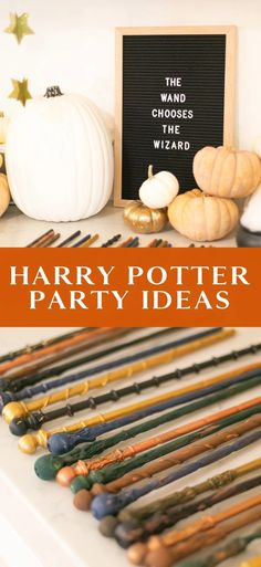 harry potter party ideas with pumpkins, candles and chalkboard on the mantle for halloween