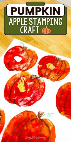 an apple stamping craft with pumpkins on it