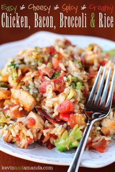 a white plate topped with rice and vegetables