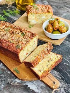 sliced loaf of bread on cutting board with bowl of olives in background and text overlay that reads healthy lentil bread