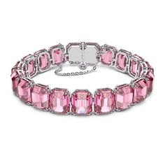 NWB Swarovski Millenia Bracelet, Octagon Cut, Pink, Rhodium Plated- 5610363 Description This pink, crystal bracelet is perfectly crafted with uniform, octagon-cut crystals on a sleek, rhodium-plated prong setting and finished with a fine-jewelry-inspired fastening. An elegant wardrobe essential, this piece can be worn on its own for an ultramodern daytime look, or teamed with the complementary necklace from the Millenia family for chic evening adornment. This bracelet is part of the Millenia family, designed by Creative Director Giovanna Engelbert for Collection III. How to close and open it: slide the hooks into the corresponding holes at the base of the end stone and push to click into place. Fasten the security chain using the small lever clasp. To open, unfasten the security chain and Swarovski Millenia, Pink Crystal Bracelet, Pink Sapphire Jewelry, Pink Jewelry, Swarovski Jewelry, Pink Bracelet, Crystal Bracelet, Pink Crystal, Italian Charm Bracelet