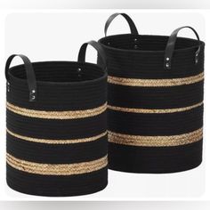 two black and gold striped baskets sitting next to each other