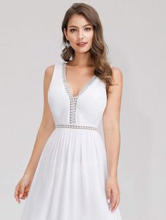 This Dress is fashionable for every occasion. the dress is made-to-order by professional tailors. You can choose from 50 colors, Regular sizes 2 to 16 and plus sizes 14w to 26W. Custom size is also available.. The product details: Color: White, Length: Long, Silhouette: A-Line, Neckline: V-Neck, Primary Fabric: Chiffon Elegant White Sleeveless V-neck Dress, Elegant V-neck Sleeveless Bridesmaid Dress, White Sleeveless V-neck Dress For Formal Occasions, Elegant White Sleeveless Dress For Prom, Formal White Sleeveless V-neck Dress, Elegant White Sleeveless Prom Dress, Elegant Sleeveless V-neck Dress With Ruched Bodice, White Sleeveless V-neck Evening Dress, White Sleeveless Elegant V-neck Dress