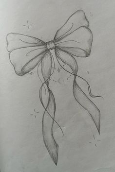 a pencil drawing of a bow on a piece of paper