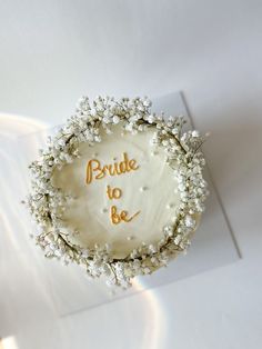 a cake with the words bride to be written on it