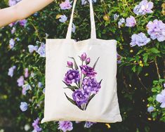 Bouquet Wildflower Tote Bag, Watercolour Gift Bags, Pressed Flowers Women Gifts, Water Colour Shoulder Bag, Bunch of Cut, Illustration Totes 👉 Product Details: The T-Shirts, V-Necks, youth and baby suits(onesie) are unisex.👈 👉Reading the Sizing Chart: Please note that the sizing chart includes the measurements of one side of the shirt, not the circumference. 👈 👉Please review all the sizing charts that were added in the product pictures. 👚 Women: Shirts will have a looser fit when choosing Purple Bags For Spring Season Gift, Tote Bag Flower Design, Bouquet Wildflower, List Of Flowers, Flower Tote, Floral Tote Bag, Bag Flower, Anniversary Shirt, Lavender Farm