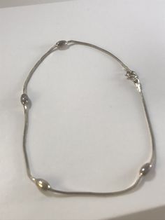 A lovely 10 inch silver chain bracelet made in Italy-Marked 925 with silver beads. Silver Beaded Chain Bracelet As Gift, Sterling Silver Beaded Bracelets In Silver, Sterling Silver Beaded Bracelets With Beaded Chain, Silver Beaded Sterling Silver Bracelets, Silver Beaded Chain Bracelets In Sterling Silver, Elegant Silver Chain Bracelet With Beaded Chain, Elegant Silver Chain Bracelet With Beaded Details, Silver Beaded Chain Bracelet For Everyday, Everyday Silver Beaded Chain Bracelet