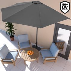 an umbrella is opened on top of a table with chairs and a potted plant