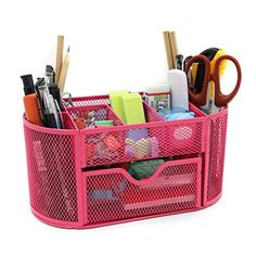 a pink mesh pen holder filled with office supplies