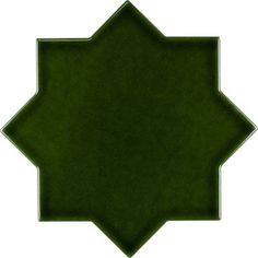 a green tile with an intricate design on the top and bottom corner, in a square shape