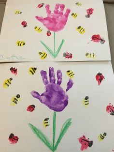 two handprints with flowers and bees on them