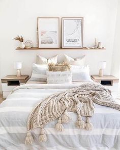 a bedroom with white walls and neutral decor