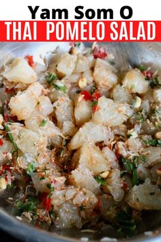 some food is in a bowl with the words yam som o that pomelo salad