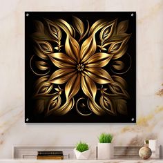 a black and gold wall hanging on the side of a fireplace