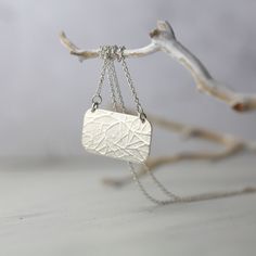 A subtle branch textured pendant is paired with my favorite dainty, but sturdy cable chain. Made to last from solid sterling silver. Carry a little bit of nature with you with this special handmade necklace. Placement of branch pattern will vary on each pendant. Solid sterling silver (nickel-free). Rectangle pendant is 1 x 0.6 inch. Sterling silver cable chain with soldered ends (for security) & mini lobster clasp. Minimalist Etched Necklaces, Minimalist Everyday Etched Necklaces, Minimalist Everyday Etched Necklace, Minimalist Etched Necklaces For Everyday Wear, Rectangle Pendant, Handmade Necklace, Cable Chain, Earring Necklace, Handmade Necklaces