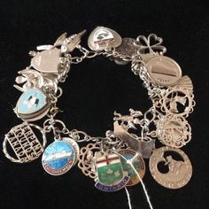 This interesting silver bracelet includes various charms from sites of interest in Canada, and many other charms! It is made of sterling silver, including the clasp, and is approximately 6.5" long. Chandler Az, Sterling Silver Charm Bracelet, Silver Charm Bracelet, Sterling Silver Charm, Charm Bracelets, Silver Charms, Silver Bracelet, Beauty Book, Jewelry Bracelets