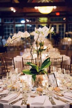 an image of a table setting with flowers and wine glasses on it for a bridal shower