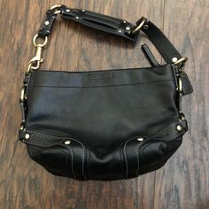 Black Leather Coach Purse, In Great Condition! Classic Black Hobo Bag With Metal Hardware, Formal Black Hobo Bag With Metal Hardware, Classic Black Hobo Bag With Silver-tone Hardware, Coach Black Shoulder Bag With Metal Hardware, Black Coach Shoulder Bag With Metal Hardware, Elegant Coach Hobo Bag With Branded Hardware, Elegant Black Coach Hobo Bag, Coach Black Hobo Bag With Gold-tone Hardware, Coach Black Hobo Bag For Formal Occasions