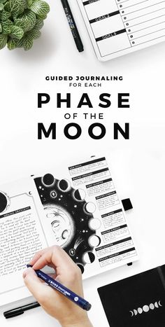 a person writing on top of a book with the words phase of the moon above it