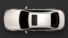 an overhead view of a white car on a black background with room for text or image