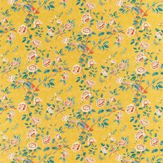 a yellow floral wallpaper with green leaves and pink flowers on the bottom half of it