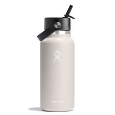 a white water bottle with a black lid