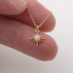 Material : Brass, Cubic, Opal (synthetic stone) Pendant : 9mm x 12mm Opal : 3mm Opal Gold Necklace, Star-shaped Opal Jewelry Gift, Celestial Star-shaped Gemstone Necklace, Gold Opal Necklace, North Star Necklace, Starburst Necklace, Necklace Opal, Celestial Necklace, Necklace Dainty