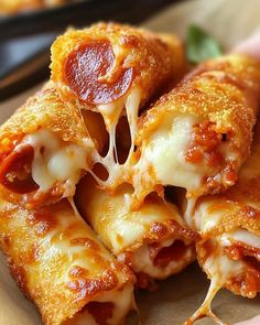 Ingredients:  1 can (8 oz) crescent roll dough 1/2 cup pizza sauce 1/2 cup shredded mozzarella cheese 1/4 cup mini pepperoni slices 1 cup crushed Nacho Cheese Doritos Directions:  Preheat Oven: Set to 375°F (190°C). Line a baking sheet with parchment paper. Assemble Rolls: Unroll crescent dough, add a spoonful of pizza sauce, sprinkle with cheese and pepperoni, and roll up. Coat with Doritos: Roll each in crushed Doritos, pressing lightly to stick. Bake: Place on baking sheet and bake for 10-12 minutes until golden and crispy. ⏰ Total: 20 min | 🔥 200 kcal/serving | 🍽️ Makes: 8 rolls  #DoritosPizzaRolls #SnackTime #EasyAppetizers #CheesyGoodness #PartyFood Doritos Pizza, Cheesy Snacks, Cheesy Snack, Crescent Dough, Crescent Roll Dough, Crescent Roll, Nacho Cheese, Pizza Rolls, Pizza Pizza