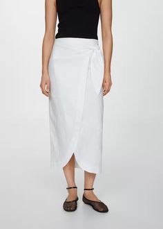 Bow linen skirt - Women | Mango USA Elegant Lined Wrap Skirt For Beach, Elegant Summer Wrap Skirt For Daywear, Elegant Asymmetrical Beach Wrap Skirt, Elegant Linen Wrap Skirt, Elegant Beach Wrap Skirt, Elegant Cotton Wrap Skirt For Spring, Elegant Relaxed Fit Cotton Wrap Skirt, Elegant Cotton Wrap Skirt, Summer Wrap Skirt For Workwear