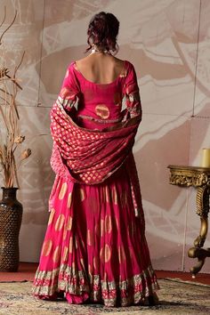 Hot pink banarasi georgette lehenga with circular motifs and gota embroidery. Comes with a blouse and a dupatta. - Aza Fashions Pink Motif Sharara For Reception, Festive Wedding Palazzo Set With Motifs, Pink Sets With Motifs For Reception, Festive Motif Palazzo Set With Traditional Drape, Bollywood Wedding Palazzo Set With Motifs, Festive Palazzo Set With Motifs And Traditional Drape, Festive Traditional Drape Palazzo Set With Motifs, Traditional Festive Palazzo Set With Motifs, Festive Motifs Palazzo Set With Traditional Drape