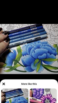 someone is drawing flowers with colored pencils