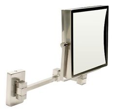 a bathroom mirror mounted to the side of a metal wall mount sink faucet