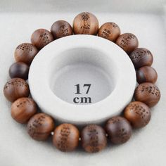 Japanese Sendan Wood Chinaberry Wood Heart Sutra Beads Bracelet Material : Sendan wood (Chinaberry wood), Silk elastic cord Length : about 16cm / 17cm / 17cm Head bead : about 10mm / 12mm / 15mm Main beads : about 7mm / 10mm / 12mm Handmade in Kyoto, JAPAN The beads of this bracelet have Heart Sutra on every beads. Melia azedarach ( Sendan Wood) , commonly known by many names, including chinaberry tree, Pride of India, bead-tree, Cape lilac, syringa berrytree, Persian lilac, and Indian lilac, is Lilac Syringa, Bead Tree, Heart Sutra, Kumihimo Bracelets, Traditional Ceramics, Amber Bracelet, Wood Hearts, Vintage Japan, Fabric Paper