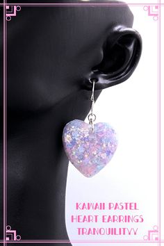 💖Welcome to Tranquilityy  I have for you an awesome pair of pastel Mix glitter blend resin heart earrings ice glitter, and much more in person how it catches the light. I use my glitter blend I also have mermaid ICE mylar blue /pink glitter flakes. Your earrings are made with resin and your glitter that gives its brilliant sparkle measures 1" across, on 925 sterling silver hooks. Your earrings will come in a gift box, take care and God bless.✨   ✨I can make these gorgeous hearts into chokers, necklaces, zipper pulls and much more, convo me for a custom listing, my hearts are more beautiful in person and would make a perfect gift.✨ Purple Earring, Earrings Kawaii, Glitter Flake, Glitter Earrings, Purple Earrings, Pink Glitter, Heart Earrings, God Bless, Jewelry Earrings Dangle