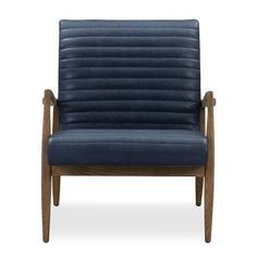 a blue leather chair with wooden legs