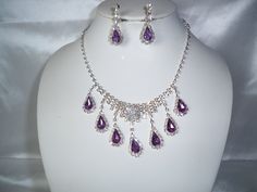 Pretty purple necklace and earrings set. Perfect for bridesmaid, mother of the bride, party, Quenceanera, pageant or any special occasion. Returns & exchanges I gladly accept cancellations Request a cancellation within: 1 hours of purchase I don't accept returns or exchanges But please contact me if you have any problems with your order. We are NOT responsible for any Rhinestones that come lose after it was shipped. Refunds are for the amount of the item(s) purchased only. Shipping costs are not Mother Of The Bride Jewelry, Bridal Business, Bride Jewelry Set, Bride Party, Bride Jewelry, Purple Necklace, Pretty Purple, Purple Rhinestone, Bridesmaid Necklace