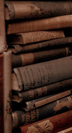 a stack of books sitting next to each other