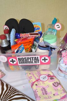 a hospital survival kit sits on top of a table next to other medical supplies and personal care items