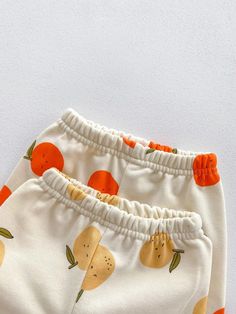 Made from Organic Cotton: An eco-friendly, breathable, and hypoallergenic fabric that’s gentle on delicate skin. Care Instructions: Machine wash on a gentle cycle, tumble dry on low. A Thoughtful Gift: Ideal for birthdays, holidays, or any day you want to make extra special for the little one in your life. Accessories not included. Fruit Graphic, Baby Fruit, Womens Dress Suits, Baby Jogger, Printed Joggers, Stylish Baby, Fruit Print, Boys Set, Jogger Set