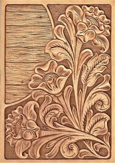 an intricate carved wood panel with flowers and leaves