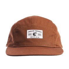 A special collection item from our friends at Twelve Weight. This is a classic 5-panel "camp style" hat made with 100% cotton twill. Slightly increased bill length for improved coverage. Additional twill front panel backer adds some structure and maintains a clean interior. Ships as a standard flat brim can also be molded to curve based on preference. - 100% cotton twill - Optic Black fabric under the visor eliminates glare - Wicking headband controls moisture - Adjustable clip & stretch loo Cotton Trucker Hat 5-panel, Vintage 5-panel Hat For Outdoor Activities, Vintage Canvas Hat For Outdoor, Vintage Canvas Outdoor Hat, Cotton 5-panel Trucker Hat With Logo Patch, Outdoor Cotton 5-panel Baseball Cap, Cotton Snapback Hat With Flat Bill For Camping, Brown Flat Bill Snapback Hat For Camping, Trucker 5-panel Camping Hat