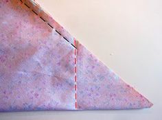 a piece of fabric that has been sewn together to make an origami triangle