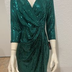 Adorable Green Sequin Knee Height Dress. Great For All Your Special Occasions. Wrap/Pull Over. Absolutely Stunning. Formal Green Dress With 3/4 Sleeves, Fitted 3/4 Length Party Dresses, Fitted Sequin Dress With 3/4 Sleeves, Fitted Dress With Sequins And 3/4 Sleeves, Green 3/4 Sleeve Dress For Party, Green 3/4 Sleeve Party Dress, Green Fitted Dress With 3/4 Sleeves, Fitted Green Dress With 3/4 Length, Holiday Party Dress With 3/4 Sleeves