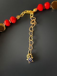 Christmas Evil Eye Necklace I believe every symbol and color has deep meaning and positive energy, and I conveyed that with the design of this necklace.Protective powers of the evil eye combined with the powerful red color. The Evil Eye bead is a prominent symbol in Turkish and many other cultures, and is highly protective. Evil Eye is also called nazar. Evil Eye beads reflect ill intent and jealousy from the 'evil eye' back to the person thinking of it, hence protecting the wearer. They also br Colorful Beads Red Evil Eye Bracelet, Red Beaded Evil Eye Bracelet, Red Spiritual Jewelry With Gemstone Beads, Handmade Red Evil Eye Bracelet For Festival, Gift Evil Eye Bracelet With Gemstone Beads, Evil Eye Bracelet With Gemstone Beads As Gift, Evil Eye Bracelet With Round Gemstone Beads, Red Gemstone Beaded Necklaces For Meditation, Red Spacer Beads Jewelry As Gift