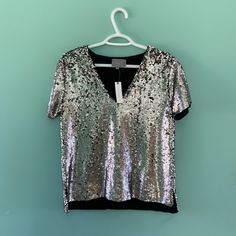 Nwt Anthro Top With Silver Sequins. Soft Tshirt Inner Lining, Fun Silver Sequins On The Outside! Spring Sequin T-shirt For Night Out, Spring Sequins T-shirt For Night Out, Spring Night Out Sequined T-shirt, Sequin T-shirt For Night Out In Spring, Chic V-neck T-shirt For Night Out, Spring V-neck Tops With Sequins, Spring V-neck Sequin Tops, Spring Short Sleeve Sequin Top, Spring V-neck Party T-shirt