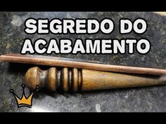 a wooden stick with a crown on it and the words segredo do acasamento