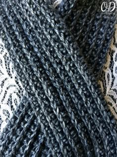 closeup of the crochet and lace on this scarf