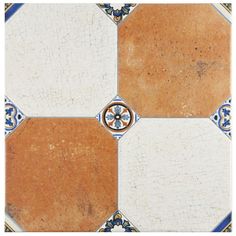 an image of a tile design with blue and white accents on it's edges